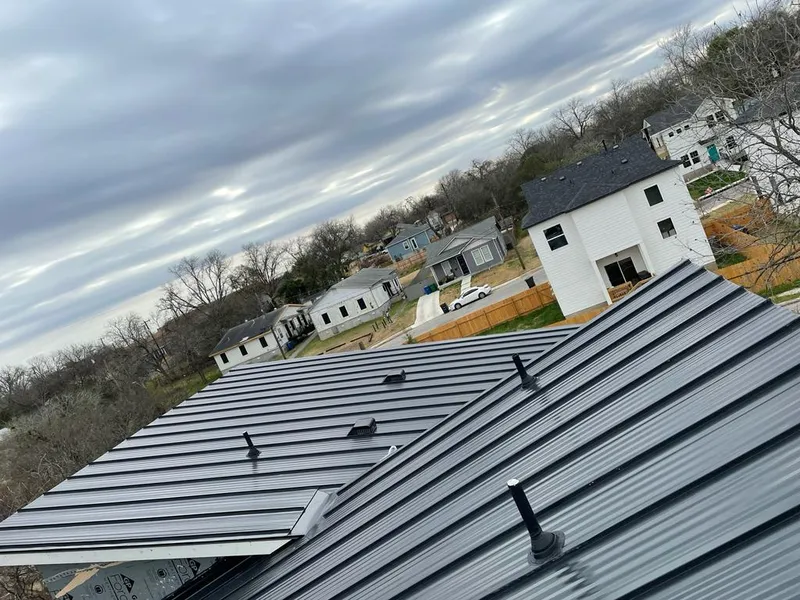 Standing seam metal roof panels with vents for Skylight Repair in Wolfeboro